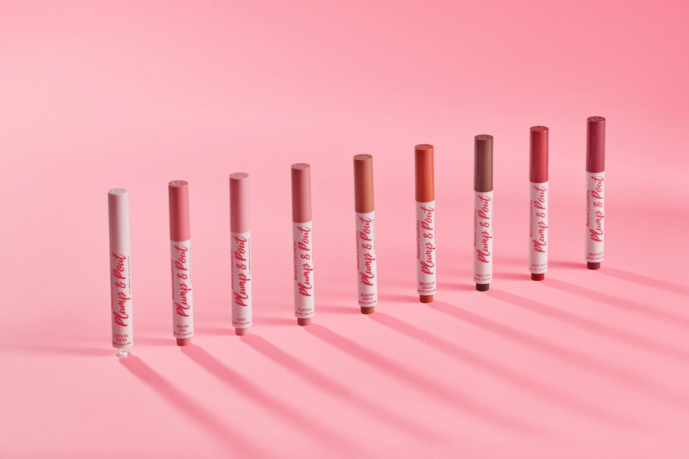 balsamo-labial-plump-and-pout-beauty-creations Envase de bálsamo labial voluminizador Plump & Pout de Beauty Creations.